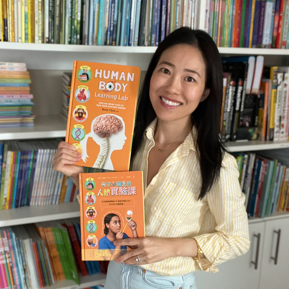Author Dr. Betty Choi with children's anatomy books